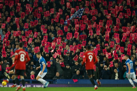 Everton fans stage a pre-planned card protest against the Premier League 10 minutes into the game.