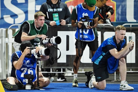Cedric Dubler, in the green photo vest, takes photos at the 2026 Australian Athletics Championships.