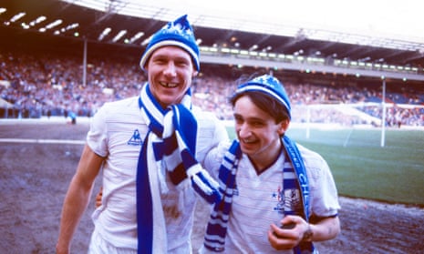 Pat Nevin and Doug Rougvie celebrate after Chelsea’s 5-4 win against Manchester City at Wembley.