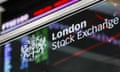 London Stock Exchange logo in front of FTSE 100 index share price information
