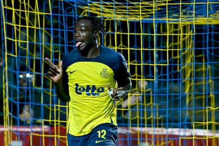 Promise David celebrates after scoring a goal for Royale Union Saint-Gilloise in Belgium.
