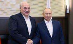 Alexander Lukashenko shakes hands with Vladimir Putin during a meeting in Sochi, Russia.