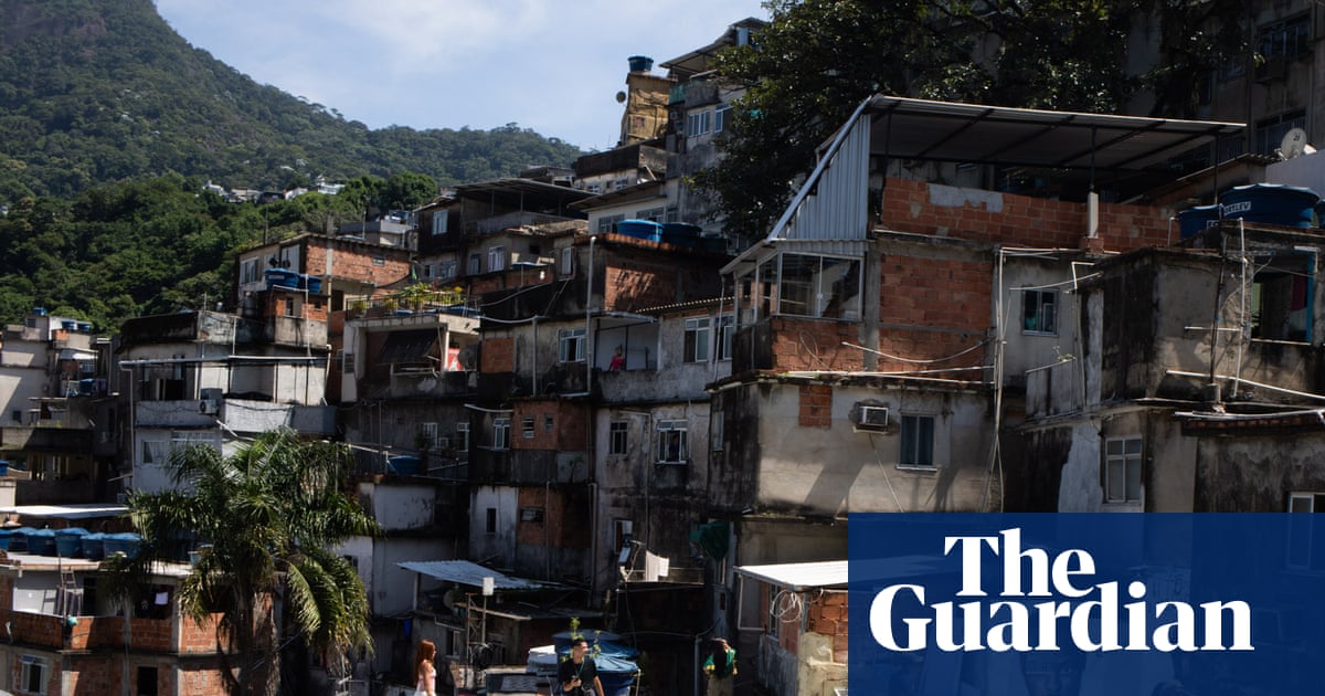 ‘It’s one of those lifetime things’: viral videos turn Rio favela rooftop into tourist hotspot