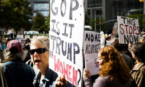 Women protest against Donald Trump near the Trump International Hotel in New York on Wednesday.