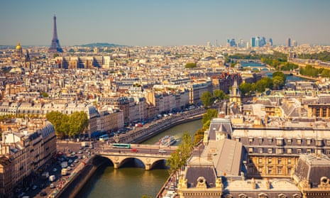 View of Paris, with the Seine in the centre and the Eiffel Tower on the horizon.