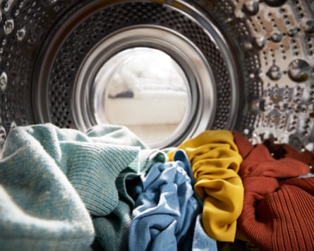 View Looking Out From Inside Washing Machine Filled With Laundry