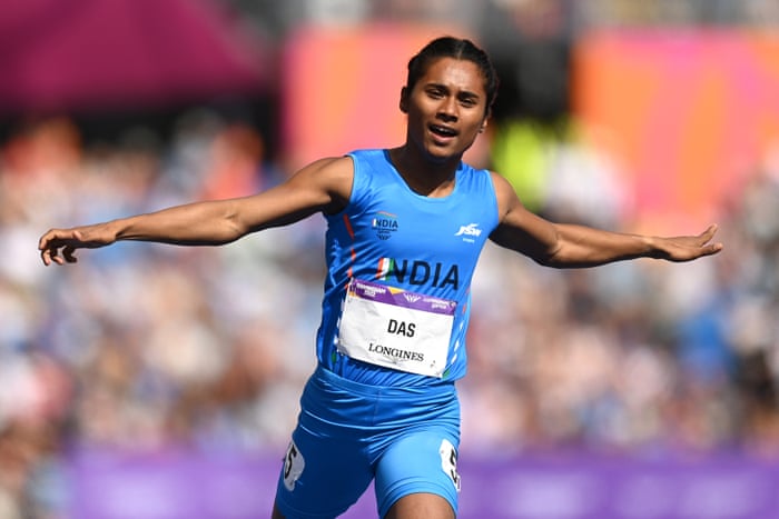 Hima Das of India wins his 200m heat.