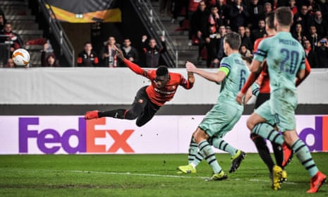 Rennes’ Ismaila Sarr heads to score their third goal.