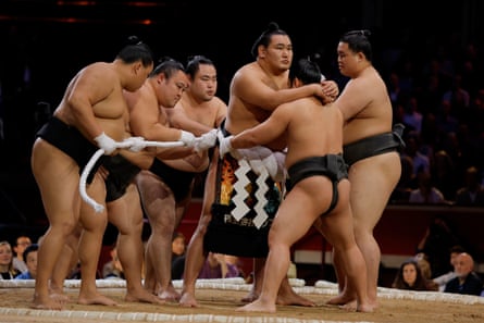 A sacred rope called the tsuna-jime is tied around one of the wrestlers. This ritual is not often seen by the public during tournaments in Japan