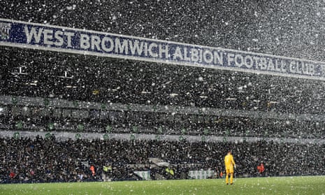 West Bromwich Albion’s Ben Foster stand in the snow during the 3-1 defeat by Manchester City played on Boxing Day 2014 at The Hawthorns. 