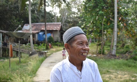 Jubaen, cultural chief of Pemaluan, a village in the development zone, fears the loss of community feeling.
