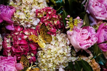 Delicate butterflies feature among the table decorations for the Kishidas.