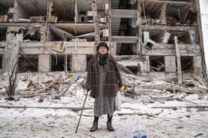 Larysa Oleksandrivna, 75, stands in front of the ruined facade of her own house in the Pavlove Pole residential area. The walls of the building crumbled after an air bomb hit the yard. Larysa Oleksandrivna lives next door – there is no heating: “When it gets warmer, because the frosts are terrible, I don’t know what else I have to wear to cover at night.” At some point there was -18 celsius at night in March in Kharkiv.