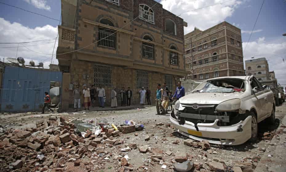 People inspect the site of an airstrike by Saudi-led coalition in Sana’a.