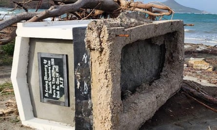 A tomb lies on its side on a beach
