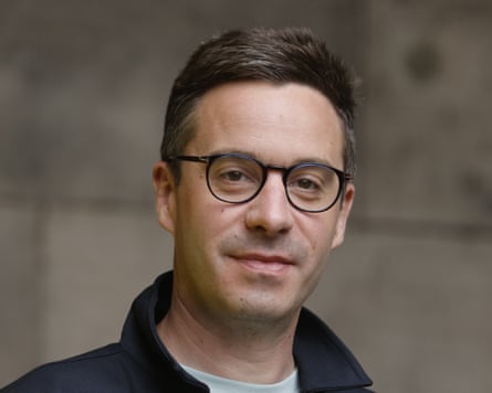 Headshot of James Graham wearing glasses