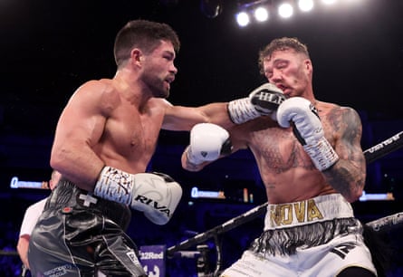 John Ryder trades blows with Zach Parker during their WBO International super-middleweight title fight in November.