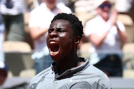 Moise Kouame celebrates winning the second set.