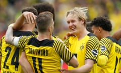 Julian Brandt is congratulated on scoring what proved Borussia Dortmund’s winner against Augsburg