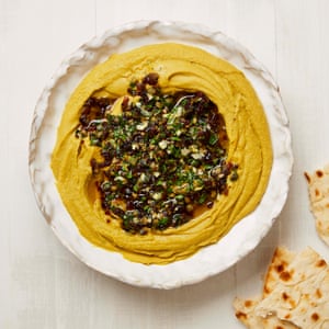 Yotam Ottolenghi’s yellow split pea dip with buttered onions and caper salsa.