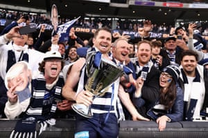 Patrick Dangerfield of the Cats celebrates with fans after winning the 2022 AFL Grand Final match between the Geelong Cats and the Sydney Swans at the Melbourne Cricket Ground on September 24, 2022 in Melbourne.