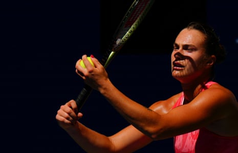 Aryna Sabalenka prepares to serve to Zheng Qinwen in their quarter-final.
