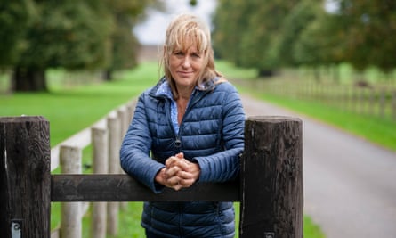 Minette Batters leaning against a gatepost