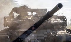 Ukrainian servicemen repair a tank that was damaged during the offensive into Russia.