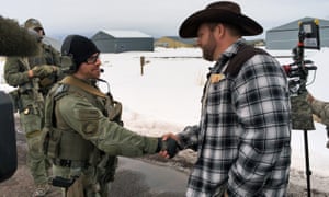 On Friday, Ammon Bundy shook hands with a federal agent as authorities attempt to resolve the three-week old standoff over federal land policies.