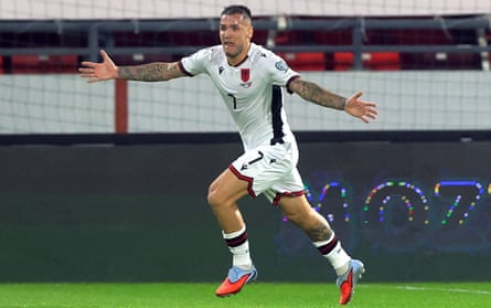 Rey Manaj celebrates scoring for Albania.