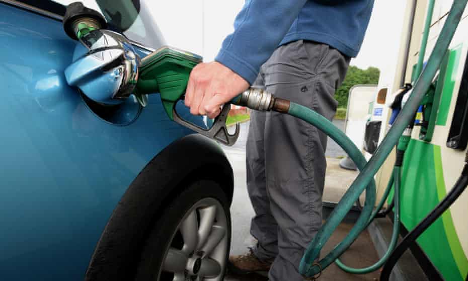 Man fills car with petrol