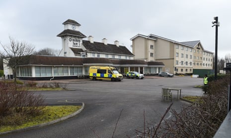 Police outside the Suites Hotel in Knowsley, Merseyside, where asylum seekers are staying, 11 February 2023.