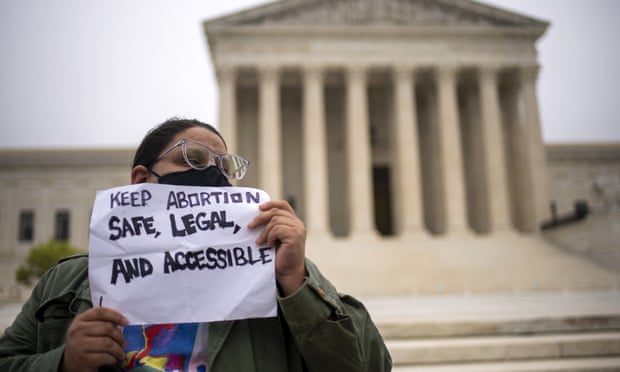 A pro-choice protester at the supreme court. Pro-choice activists are urging supporters to keep making their voices heard.