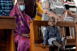 A young boy attends a service at St Teresa’s Church, in Chennai, India
