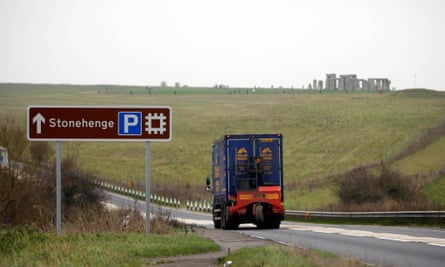 A lorry drives near Stonehenge in Wiltshire