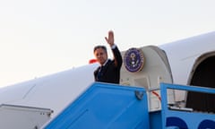 Antony Blinken waves as he disembarks from his plane in Tel Aviv.