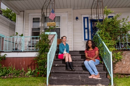 Anne Elizabeth Moore and Tomeka Langford in the neighborhood where they both lived