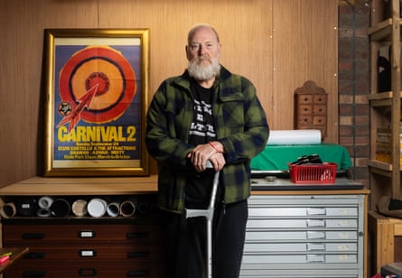 Rock Against Racism founder Red Saunders, with a poster for one of its concerts from 1978.