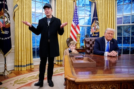 Tesla and SpaceX CEO Elon Musk, accompanied by U.S. President Donald Trump (R), and his son X Musk, speaks during an executive order signing in the Oval Office at the White House on February 11, 2025 in Washington, DC. Trump is to sign an executive order implementing the Department of Government Efficiency’s (DOGE) “workforce optimization initiative,” which, according to Trump, will encourage agencies to limit hiring and reduce the size of the federal government. (Photo by Andrew Harnik/Getty Images)