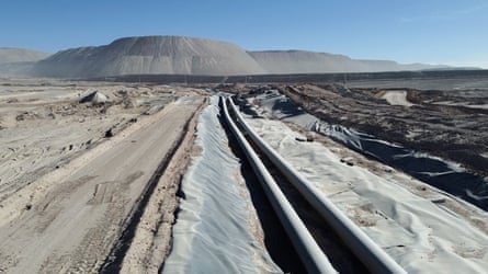 Transportation tubes of water at a desert site for lithium and copper mining in Chile