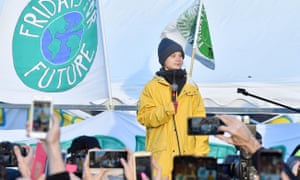 Thunberg speaking at a Fridays For Future rally in Turin