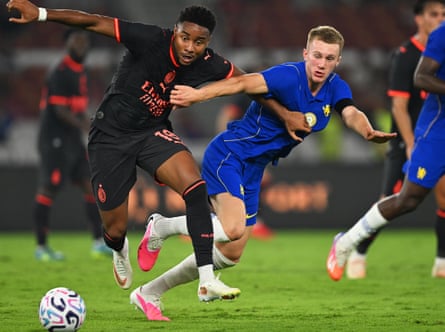 Reggie Watson (right) in pre-season action for Chelsea.