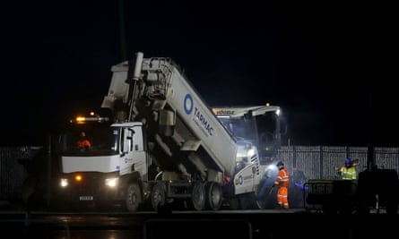 Tarmac being laid last night, Tuesday December 15, 2020. Photo credit should read: Gareth Fuller/PA Wire