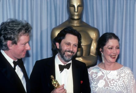 Director Hugh Hudson, David Puttnam and presenter Loretta Young at the 1982 Oscar ceremony.