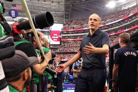 Visibly unhappy with the scrum of photographers during the anthems.