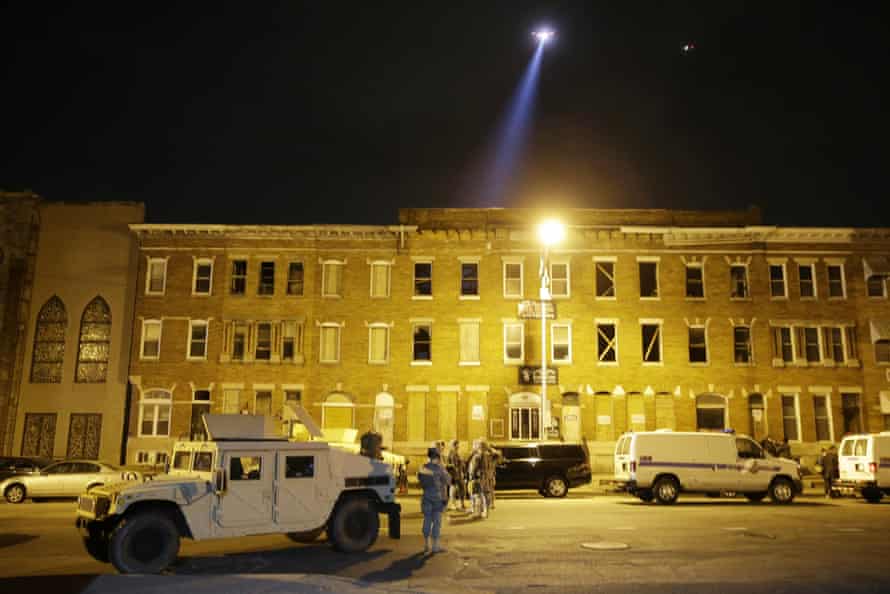 National Guard stand by during a 10 p.m. curfew in Baltimore.