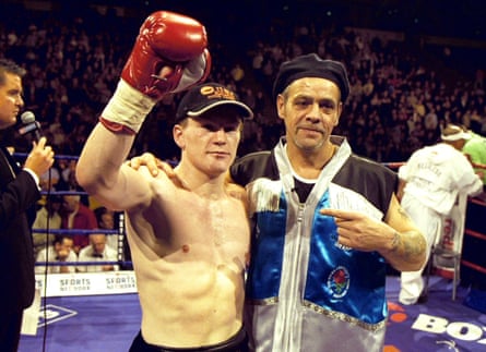 Ricky Hatton lifts his glove while Billy Graham points at him after victory over Freddie Pendleton in 2001