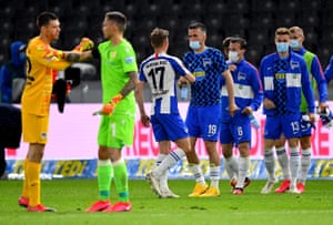 The Hertha Berlin players celebrate victory.