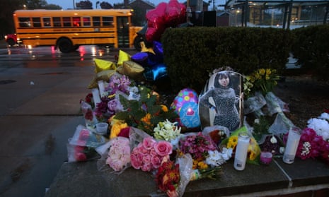 A memorial to the two victims at Central Visual and Performing Arts high school in St Louis.