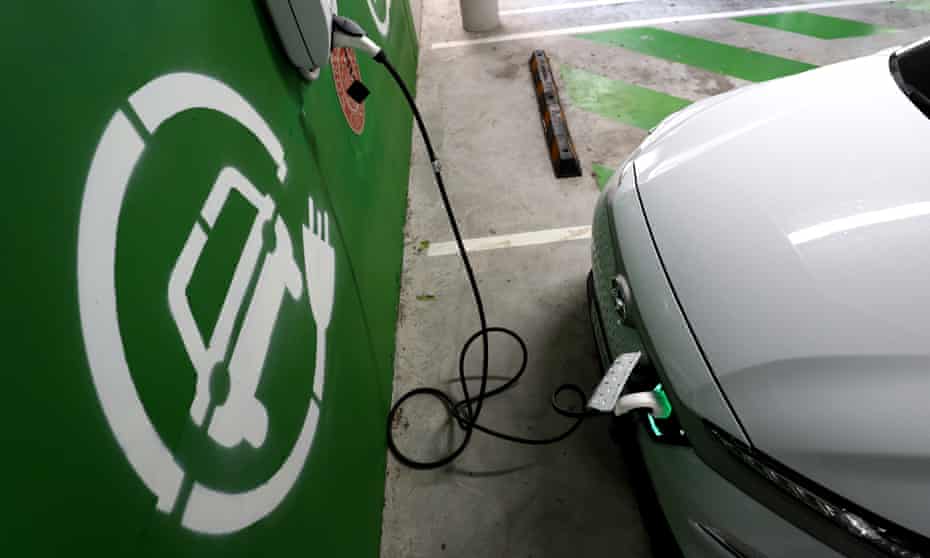 A Hyundai Kona Electric charges at an EV charge station in Sydney, Australia